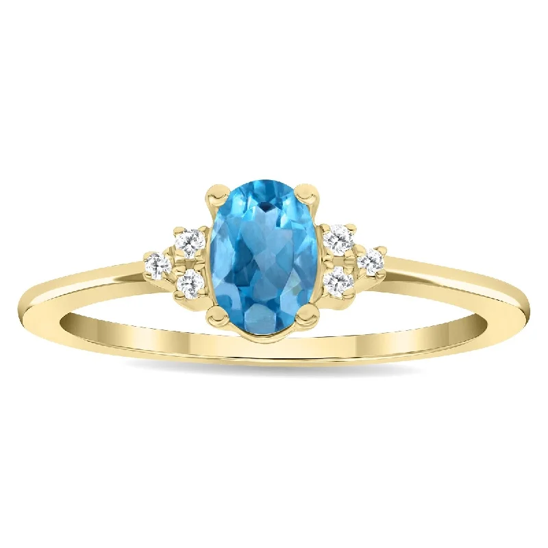 Women's Oval Shaped Blue Topaz and Diamond Half Moon Ring in 10K Yellow Gold