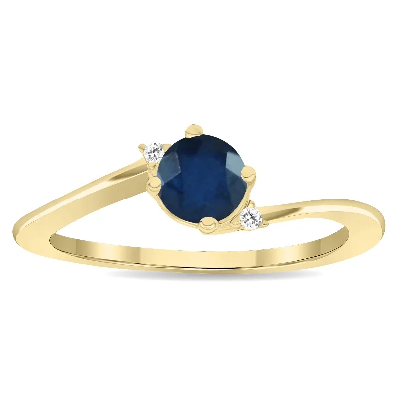 Women's Round Shaped Sapphire and Diamond Wave Ring in 10K Yellow Gold